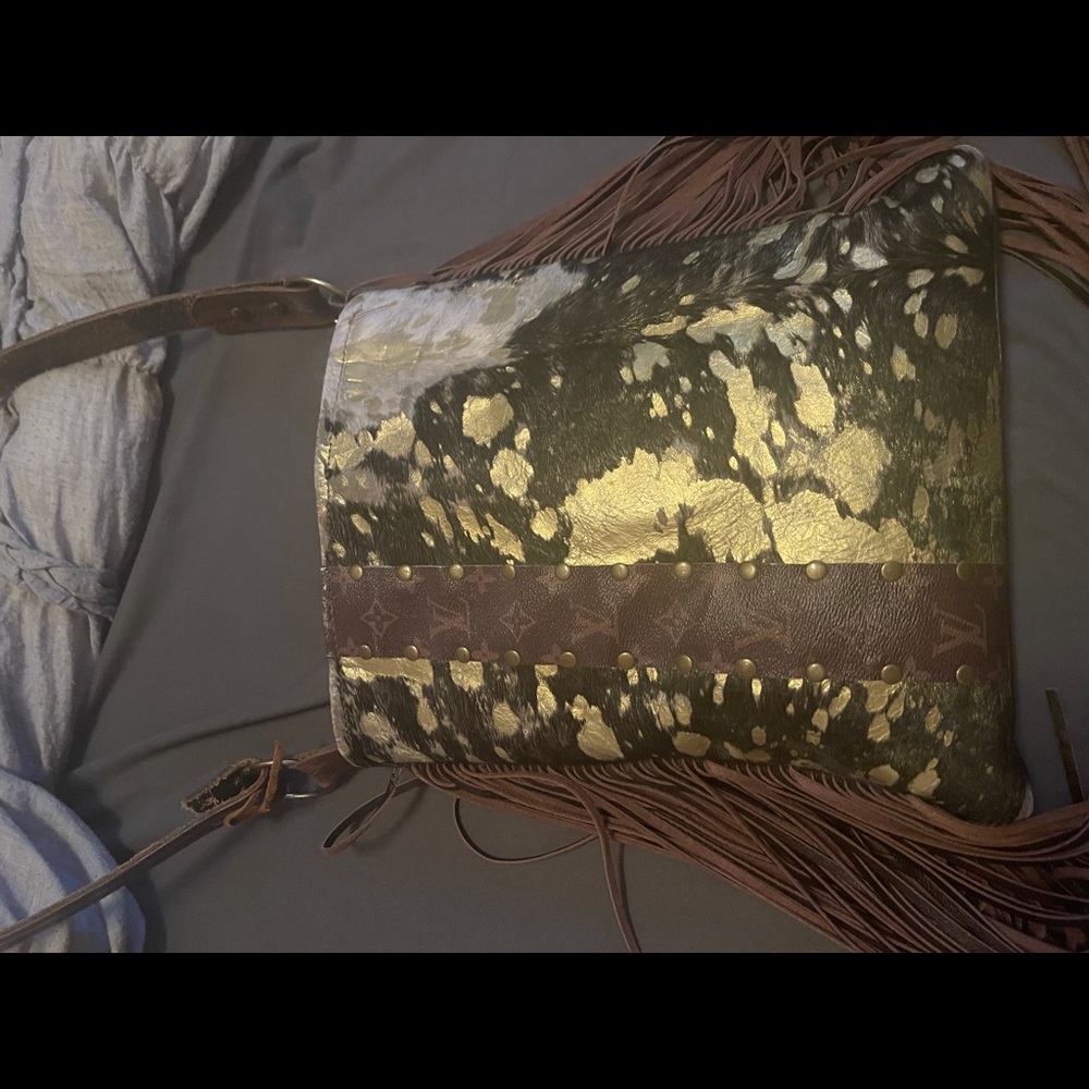 Crossbody cowhide purse with authentic LV strip